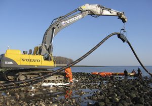 Large Crane Holding Cable for Underwater Installation Near Long Island, NY